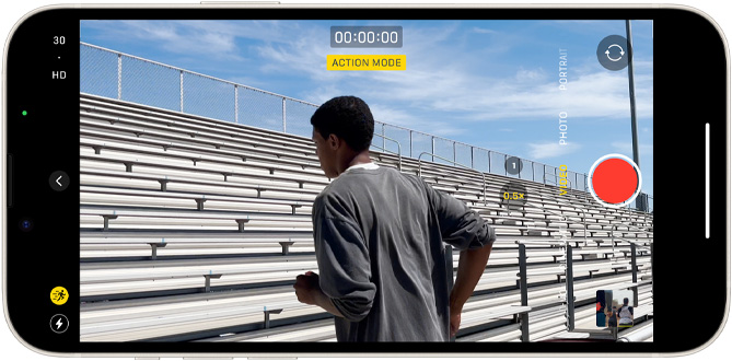 A still-life shot from an Action mode video that captures a person running up some bleachers.