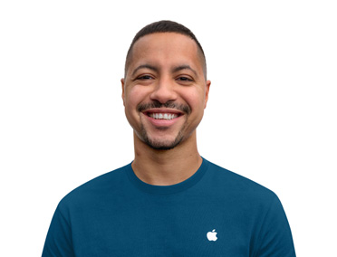 Egy barátságos, mosolygó Apple-szakértő