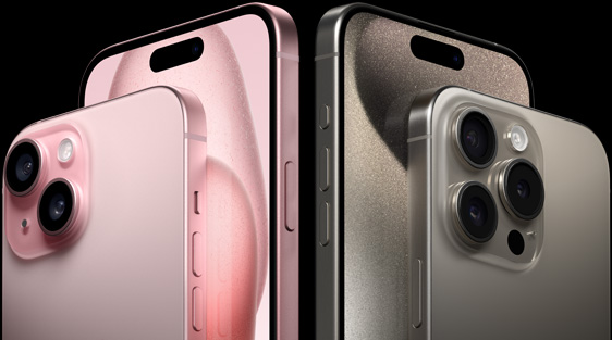 Two models side by side. iPhone 15, all screen design, Dynamic Island centered near top. Pink finish back, advanced camera system in top left corner. iPhone 15 Pro, all screen design, Dynamic Island centered near top. Natural Titanium finish back, Pro camera system in top left corner.