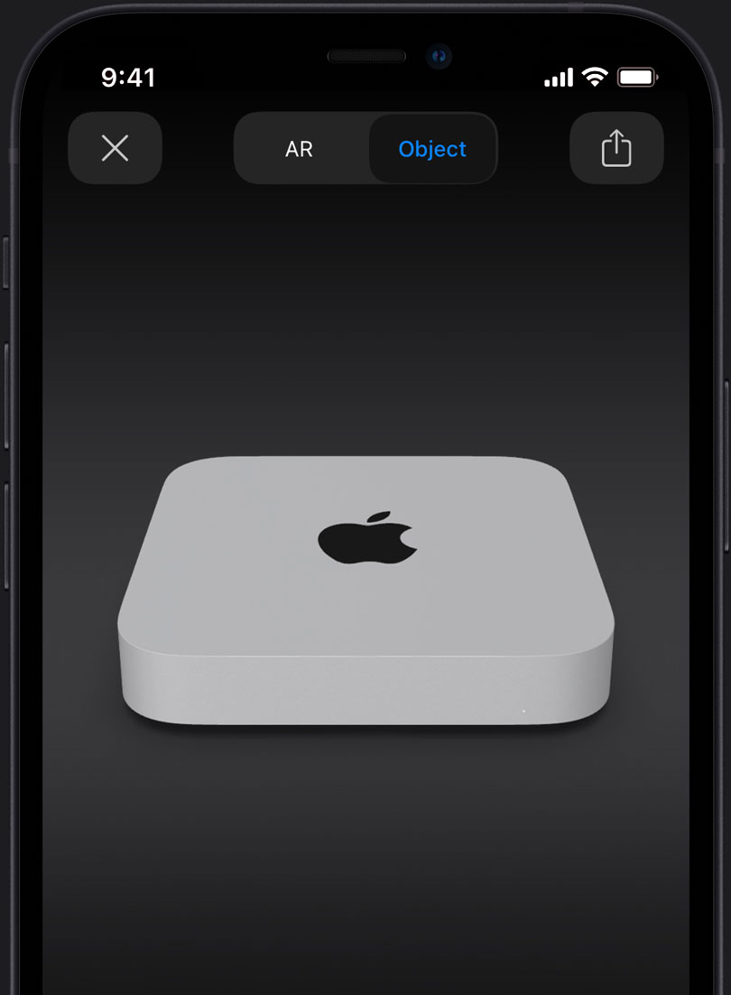 Mac mini серебристого цвета в дополненной реальности
