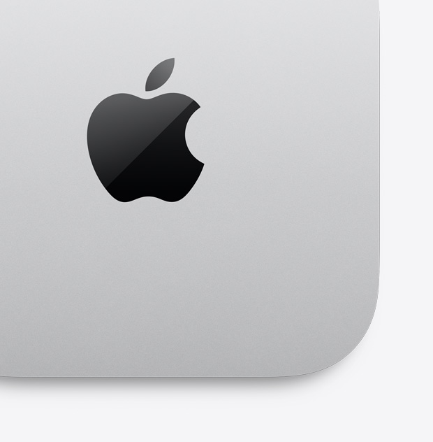 Appleのロゴが付いたシルバーのMac miniを、上からクローズアップで見た図