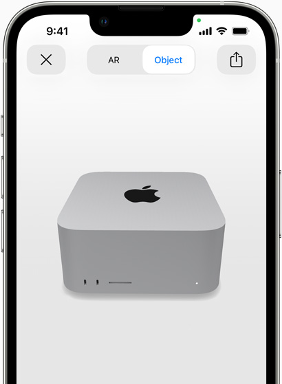 Un iPhone previsualizando un Mac Studio con realidad aumentada
