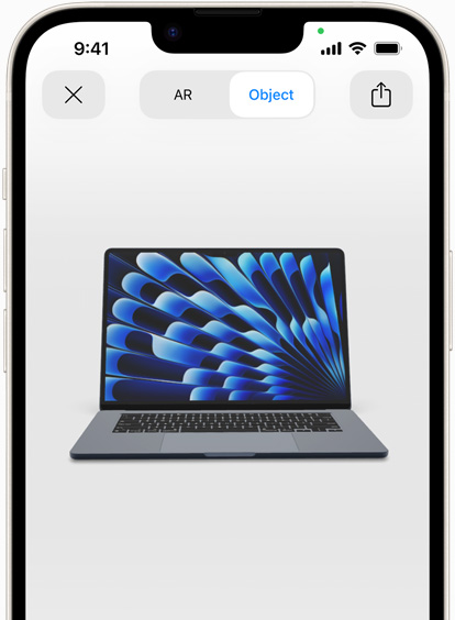 Preview of MacBook Air in Midnight color being viewed in AR experience on iPhone