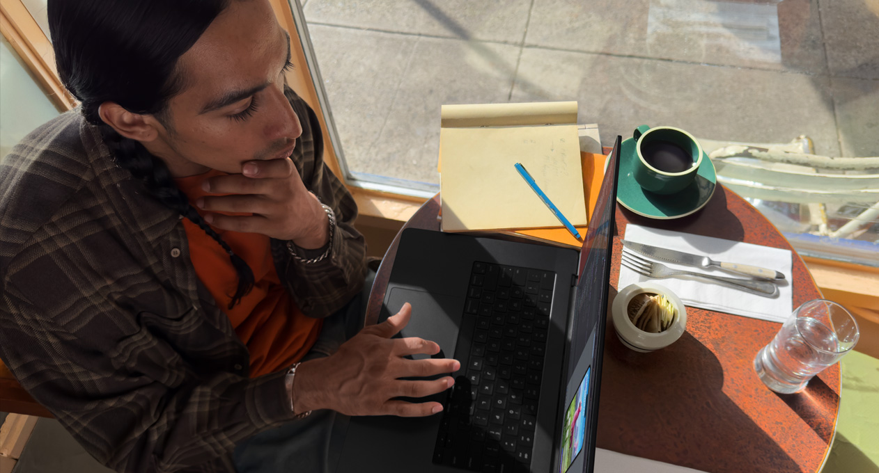 Person Working On a MacBook Pro M3 Space Black