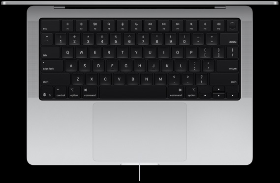 Top-down view of open MacBook Pro 14″ showing Force Touch trackpad located below keyboard