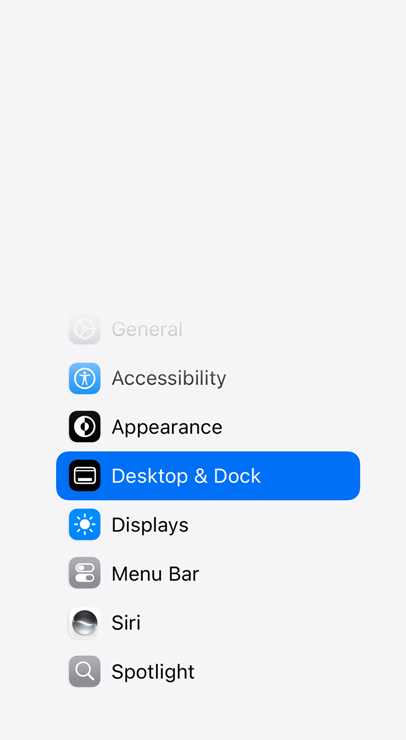 Step 2: Click Desktop & Dock in the sidebar, showing Desktop & Dock highlighted in blue within the System Settings list.