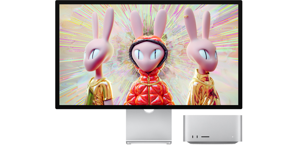 Mac Studion vieressä Studio Display, jonka näytöllä 3D-kuva ihmismäisistä jänishahmoista.