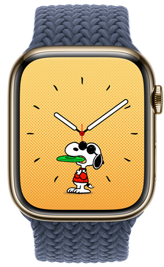 Watch face depicting Snoopy wearing sunglasses and a red turtleneck sweater, with a green frisbee in his mouth.