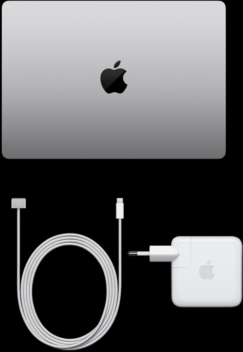 MacBook Pro, màu bạc, mặt trên, đang đóng, bên cạnh cáp sạc và bộ tiếp hợp